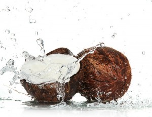 cracked coconut with splashing water